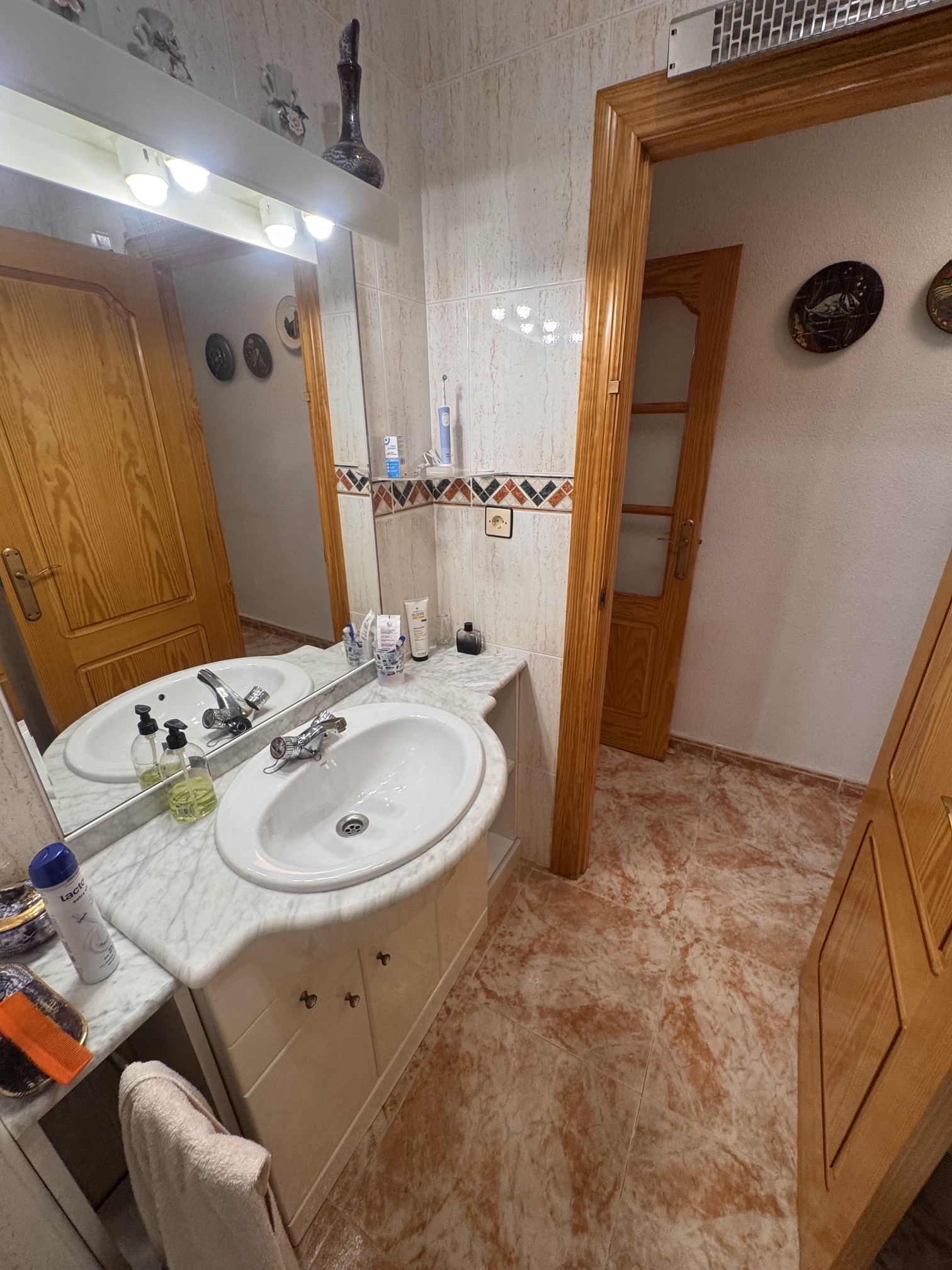 Just on the Market ***Fabulous Condition * 3 Bedroom / 2 Bathroom * One level house with Separate Annexe Upstairs with Double Bedroom * Large Storeroom & Large Solarium * The Price also includes a Separate Private * Double Underground Parking & Storage Room * €199,995 *