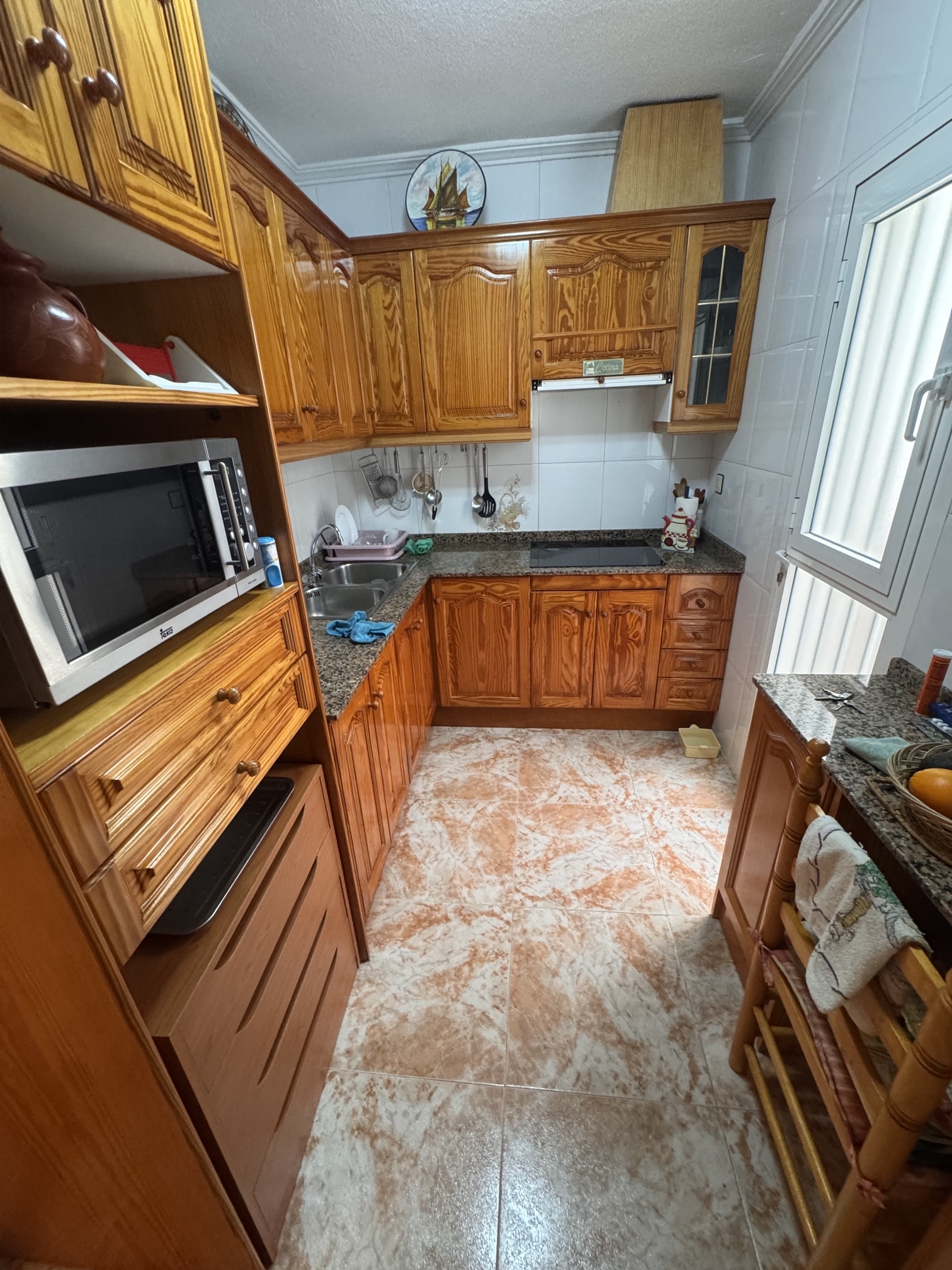 Just on the Market ***Fabulous Condition * 3 Bedroom / 2 Bathroom * One level house with Separate Annexe Upstairs with Double Bedroom * Large Storeroom & Large Solarium * The Price also includes a Separate Private * Double Underground Parking & Storage Room * €199,995 *