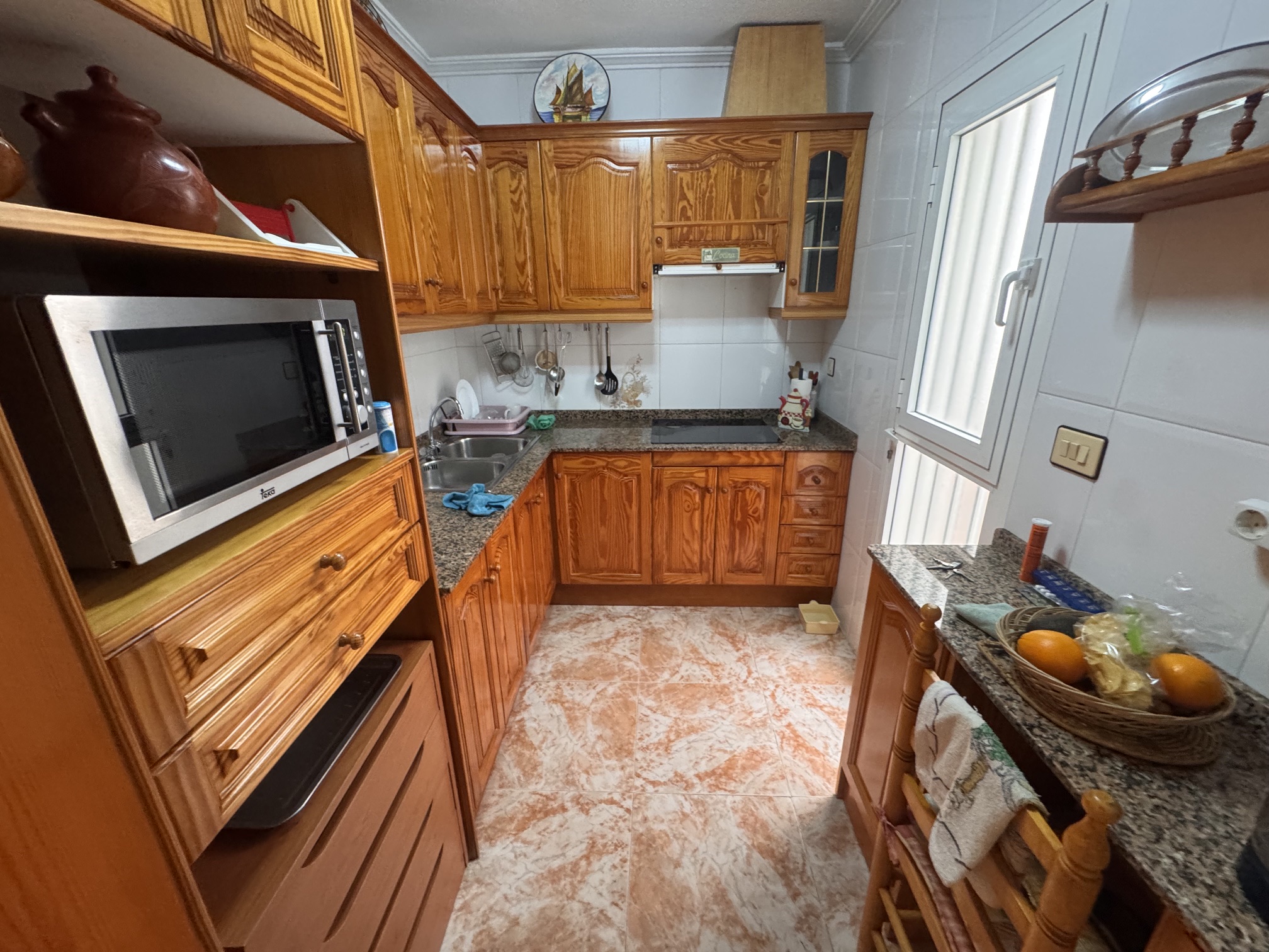 Just on the Market ***Fabulous Condition * 3 Bedroom / 2 Bathroom * One level house with Separate Annexe Upstairs with Double Bedroom * Large Storeroom & Large Solarium * The Price also includes a Separate Private * Double Underground Parking & Storage Room * €199,995 *